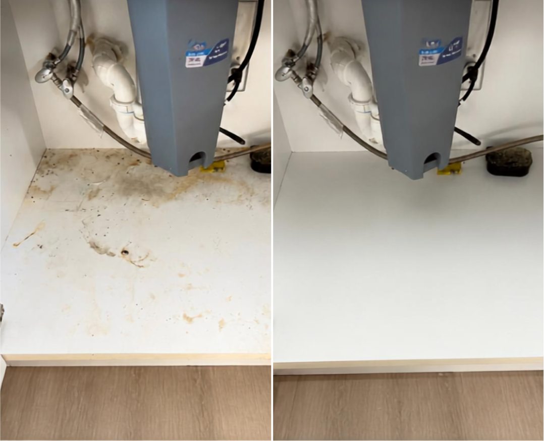 Before and after: the base of an under-sink cabinet, water stains and grime removed